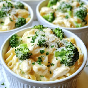 Cooking Chicken and Broccoli Alfredo Skillet is easy when you have the right ingredients. Here’s what you need: - 2 boneless, skinless chicken breasts - 2 cups fresh broccoli florets - 8 ounces fettuccine or preferred pasta - 1 cup heavy cream - 1 tablespoon extra virgin olive oil - 3 cloves garlic, finely minced - 1 cup freshly grated Parmesan cheese - Salt and fresh black pepper - 1/2 teaspoon dried Italian seasoning blend - Fresh parsley, finely chopped (for garnish) Using fresh ingredients makes a big difference in taste. The chicken adds protein, while broccoli gives you fiber and color. Pasta brings it all together, and the cream makes it rich and smooth. The Parmesan cheese adds a salty kick that ties the whole dish together. You can also add Italian seasoning for extra flavor if you like. Don't forget the parsley; it makes everything look beautiful! For the full recipe, check out the details above. - Heat 1 tablespoon of olive oil in a large skillet over medium heat. - Add 2 diced chicken breasts. Season with salt, pepper, and Italian herbs. - Sauté the chicken for about 5-7 minutes until it is browned and fully cooked. - Remove the chicken from the skillet and set it aside on a plate. - In the same skillet, lower the heat slightly. - Add 3 minced garlic cloves and sauté for about 1 minute. - Add 2 cups of broccoli florets to the skillet. Cook them for 3-4 minutes. - Stir occasionally until they are bright green and tender but still crisp. - Pour in 1 cup of heavy cream and turn the heat up a bit. - Bring the cream to a gentle simmer. - Gradually mix in 1 cup of grated Parmesan cheese while stirring. - Keep stirring until the cheese melts and forms a creamy sauce. - Return the cooked chicken and 8 ounces of cooked pasta to the skillet. - Toss everything together to coat the pasta and chicken in the sauce. - Heat for an additional 2-3 minutes until everything is warm. - Taste your dish and adjust the seasoning with more salt and black pepper if needed. To avoid clumping cheese in your Alfredo, use room temperature cheese. Cold cheese can seize up and clump when added to the hot sauce. Stir it in slowly while the sauce simmers. Keep your heat on low to medium. This helps the cheese melt evenly without burning. Timing is key when cooking pasta. Start boiling your water before you cook the chicken. This way, the pasta will be ready when your sauce is done. If you have leftover pasta, store it in an airtight container. Drizzle a little olive oil to prevent it from sticking together. For an elegant meal, serve your Chicken and Broccoli Alfredo in shallow bowls. Sprinkle extra Parmesan on top and add a few reserved broccoli florets. This adds color and makes the dish pop. Complement your meal with a crisp green salad or garlic bread for a complete dinner experience. {{image_4}} You can swap chicken for shrimp or tofu. Shrimp cooks fast and adds a sweet taste. Tofu gives a nice texture and works well in a vegetarian version. Just make sure to press the tofu to remove extra water. Add more veggies like bell peppers or carrots for color and crunch. If you need a gluten-free option, use gluten-free pasta. There are many types available, like rice or corn-based. You can also try different shapes, such as penne or rotini. Each shape holds sauce differently, so pick one you like best! To make a lighter Alfredo, use half-and-half instead of heavy cream. You can also mix in vegetable broth for more flavor without the extra fat. Adding herbs like basil or spices like red pepper flakes can elevate the taste. They bring freshness and a hint of warmth to the dish. For the full recipe, check out the creamy Chicken and Broccoli Alfredo Skillet. To keep your Chicken and Broccoli Alfredo Skillet fresh, follow these steps: - Refrigeration: Place leftovers in an airtight container. This helps keep the dish fresh. Store in the fridge for up to three days. - Freezing: If you want to save it longer, freeze it. Use a freezer-safe container or bag. Make sure to remove as much air as possible. This can last for up to three months in the freezer. When it's time to enjoy your leftovers, here’s how to reheat them: - Stovetop Method: Heat a skillet over medium heat. Add a splash of cream or broth to keep it creamy. Stir occasionally until warm. - Microwave Method: Place in a microwave-safe dish. Add a little cream or water. Cover with a lid or microwave-safe wrap. Heat in short bursts, stirring in between. To keep your meal creamy, make sure not to overheat. Enjoy your delicious Chicken and Broccoli Alfredo Skillet again! For the full recipe, check the section above. Yes, you can make this dish ahead of time. Here are some tips: - Prep the chicken: Dice the chicken and season it. Store it in the fridge for up to one day. - Chop the broccoli: Cut the florets and keep them in an airtight container. - Cook the pasta: You can cook the pasta in advance. Just toss it with a bit of oil to prevent sticking. - Prepare the sauce: You can prepare the Alfredo sauce ahead. Just reheat it gently before serving. Thickening your Alfredo sauce is easy! Here are some methods: - Add more cheese: Increase the amount of Parmesan cheese for a richer sauce. - Use cornstarch: Mix a tablespoon of cornstarch with cold water. Add it to the sauce while stirring. - Cream cheese: Blend in a few ounces of cream cheese for extra creaminess. - Simmer longer: Let the sauce cook a bit longer to reduce and thicken naturally. You can pair this meal with many sides. Here are some ideas: - Garlic bread: It complements the creamy sauce well. - Mixed salad: A fresh salad adds a nice crunch and balance. - Roasted vegetables: Pair with seasonal veggies for added nutrition. - Wine: A glass of white wine enhances the flavors beautifully. For the full recipe, check the earlier section. This blog post covered how to make a tasty Chicken and Broccoli Alfredo Skillet. You learned about the key ingredients, including chicken, broccoli, and creamy sauce. We went step-by-step through cooking it all perfectly. I shared tips for storage and reheating to keep your leftovers fresh. Remember, you can customize this dish with different proteins and pasta types. Enjoy making this meal, and don't hesitate to explore new flavors! Happy cooking!