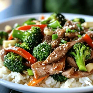 - Thinly sliced flank steak - Broccoli florets - Red bell pepper - Soy sauce - Oyster sauce (optional) - Cornstarch - Sesame oil - Vegetable oil - Garlic and ginger When you cook beef and broccoli stir-fry, you need fresh, high-quality ingredients. The beef should be thinly sliced flank steak. This cut is tender and cooks quickly. Broccoli florets provide a nice crunch and color. Red bell pepper adds sweetness and depth. For the marinade, you’ll use soy sauce. This gives the beef a savory taste. Oyster sauce is optional but can add an extra layer of flavor. Cornstarch helps make the beef nice and tender. In the cooking process, sesame oil adds a rich, nutty flavor. Vegetable oil has a high smoke point, making it great for stir-frying. Garlic and ginger will bring warmth and depth to the dish. These ingredients create a delicious dish. You can find the Full Recipe for more details on how to combine these flavors perfectly. First, gather your ingredients. You’ll need flank steak, soy sauce, oyster sauce, and cornstarch. In a medium bowl, mix the flank steak with soy sauce, oyster sauce, and cornstarch. Make sure the beef is coated well. Let it marinate for 15 minutes. This helps the beef soak in all the flavors. While the beef marinates, get a pot of water boiling. Add salt to the water. Once it’s boiling, add the broccoli florets. Blanch them for about 2 minutes. This makes them bright green and tender-crisp. After that, quickly put the broccoli in an ice bath. This stops the cooking. Drain the broccoli and set it aside. Heat a large pan or wok on medium-high heat. Add vegetable oil when it’s hot. Now, arrange the marinated beef in a single layer in the pan. Let it cook for 2-3 minutes without stirring. This gives the beef a nice brown color. Once browned, remove it from the pan and set it aside. In the same pan, add minced garlic and grated ginger. Sauté for about 30 seconds. You’ll smell a nice aroma. Next, add the sliced red bell pepper and the blanched broccoli. Stir-fry for 2-3 minutes. The veggies should be tender yet still crisp. Return the cooked beef to the pan. Drizzle sesame oil over everything. Stir well and cook for another 2 minutes. Taste the dish and add more soy sauce if needed. Now, you’re ready to serve! Enjoy your Beefy Broccoli Bonanza over jasmine rice, garnished with sesame seeds and green onions. For the best flavor, marinate the beef for about 15 minutes. This short time helps the meat absorb the soy sauce and oyster sauce. The cornstarch adds a nice texture. If you let it sit longer, the beef can become too soft. Just remember, 15 minutes is the sweet spot! When stir-frying, use a large pan or wok. Heat the vegetable oil on medium-high heat until it shimmers. This temperature helps to sear the beef quickly. Avoid overcrowding the pan to get a nice golden crust. Cook the beef in a single layer for 2-3 minutes without stirring. Then, you can add the veggies and aromatics for the best flavor. Serve your Beefy Broccoli Bonanza over fluffy jasmine rice. The rice soaks up all the delicious sauce. For garnishes, sprinkle sesame seeds and sliced green onions on top. They add color and a fresh taste. Enjoy your meal with a side of your favorite steamed dumplings for a complete feast! {{image_4}} If you want to change the meat, you have options. Chicken works great in this dish. Just cut it into thin strips like the beef. Tofu is perfect for a vegetarian option. Use firm tofu and press it to remove extra water. Shrimp is also a tasty choice. Cook it until it turns pink, which takes only a few minutes. Feel free to swap out the broccoli. Other vegetables work well too. Carrots add a nice crunch and sweetness. Bell peppers in different colors can enhance your dish, too. Snow peas or snap peas are quick-cooking and add a fresh bite. You can even add mushrooms for an earthy flavor. Mix and match to find your favorite blend. Want to take it up a notch? Add more flavors! A splash of hoisin sauce can add some sweetness. Try chili paste if you like heat. You could also throw in sesame seeds for crunch. Fresh herbs like basil or cilantro work wonders as a finishing touch, giving freshness to each bite. To store leftovers, allow the dish to cool first. Use an airtight container to keep them fresh. Place the container in the fridge. This keeps your beef and broccoli tasty for up to three days. Make sure to label your container with the date. When reheating, use a skillet over medium heat. Add a splash of water to keep the dish moist. Stir often to heat evenly. You can also use a microwave. Cover the dish loosely to avoid steam build-up. Heat in short bursts, stirring in between. To freeze, let the dish cool completely. Use freezer-safe bags or containers. Remove as much air as possible before sealing. It can last up to three months in the freezer. When ready to eat, thaw overnight in the fridge. Reheat on the stove for best results. For the full recipe, check out the detailed cooking method for Beefy Broccoli Bonanza. Yes, you can use frozen broccoli. Pros: - It’s convenient and saves time. - It’s often frozen at peak freshness, keeping nutrients. Cons: - Frozen broccoli may be softer than fresh. - It can release more water in the pan. If you want a soy sauce swap, try these: - Tamari is a great gluten-free option. - Coconut aminos work well for a sweeter taste. - Worcestershire sauce adds a nice depth of flavor. To make your Beef and Broccoli gluten-free, use these options: - Replace soy sauce with tamari or coconut aminos. - Use gluten-free cornstarch instead of regular. - Check your oyster sauce brand for gluten-free options. For the complete cooking method and details, check out the Beefy Broccoli Bonanza 🥦. You now have all the key steps to make Beefy Broccoli Bonanza. We discussed main ingredients like flank steak, broccoli, and red bell pepper. We also covered the marinade and cooking oils you need. With tips on marinating, cooking techniques, and serving, you can impress anyone. Feel free to tweak the recipe with alternative proteins and veggies. Proper storage techniques also help maintain freshness. Dive into your kitchen and enjoy an easy, delicious meal!