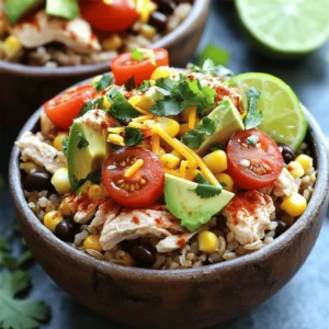 For a tasty chicken burrito bowl, you need fresh and simple ingredients. Here’s what you’ll gather: - 2 cups of fluffy cooked brown rice - 1 lb diced chicken breast, preferably organic - 1 tablespoon high-quality olive oil - 1 teaspoon chili powder - 1 teaspoon ground cumin - 1/2 teaspoon garlic powder - 1/2 teaspoon onion powder - Salt and freshly cracked black pepper, to taste - 1 can of black beans, rinsed thoroughly and drained - 1 cup sweet corn (fresh, canned, or frozen) - 1 cup cherry tomatoes, lovingly halved - 1 ripe avocado, diced into bite-sized pieces - 1/2 cup shredded cheese (cheddar or a delightful Mexican blend) - 1/4 cup fresh cilantro, chopped finely - Lime wedges, for serving Each ingredient adds flavor and texture. The brown rice gives a hearty base. The chicken, seasoned with chili and cumin, adds warmth. Black beans and corn bring sweetness. Fresh tomatoes and avocado add color and freshness. Finally, cheese and cilantro give a lovely finish. This mix makes every bite a delight. For the full recipe, check out the [Full Recipe]. 1. Heat olive oil in a large skillet over medium heat. Let it shimmer a bit. 2. Add diced chicken to the skillet. Sprinkle with chili powder, cumin, garlic powder, onion powder, salt, and pepper. 3. Sauté the chicken for about 5-7 minutes. Stir it often. Ensure it is fully cooked and golden. The chicken should not be pink inside. 1. Cook the brown rice according to the package instructions. Make sure it is fluffy and tender. 2. In serving bowls, layer the rice first. Then add black beans, sweet corn, and the seasoned chicken. 3. Top each bowl with halved cherry tomatoes, diced avocado, and shredded cheese. 1. Finish each bowl with fresh cilantro and a squeeze of lime juice. This adds a bright flavor. 2. Serve the bowls right away. Include lime wedges on the side for a refreshing touch. For detailed cooking steps, check the Full Recipe. Enjoy making these easy chicken burrito bowls! To ensure your chicken is cooked through, start by cutting it into small pieces. This helps the chicken cook evenly and faster. Use a meat thermometer to check if it’s at 165°F. If you don’t have one, cut a piece open. It should be white inside, not pink. For optimal rice cooking, I recommend using a rice cooker if you have one. It makes perfect rice every time. If not, follow the package instructions carefully. Use the right water ratio for fluffy rice. Let it sit covered for a few minutes after cooking to steam. To enhance flavor, try adding a pinch of smoked paprika or cayenne pepper for heat. These spices add depth to the dish. You can also mix in fresh lime juice or diced jalapeño for a fresh kick. For serving suggestions, consider adding a dollop of sour cream or Greek yogurt. These add creaminess and balance the spices. You could also top with salsa or pico de gallo for a fresh twist. Presentation is key for restaurant-style bowls. Use deep, colorful bowls to make the dish pop. Layer the ingredients in a way that shows off their colors. Start with rice, then beans, followed by chicken, and finally the colorful toppings. For garnishing, sprinkle fresh cilantro on top for a burst of green. Add a lime wedge on the side for a splash of color and zest. You can also use a sprinkle of cheese as a finishing touch for added visual appeal. For the full recipe, check out the detailed instructions above. {{image_4}} You can change up your chicken burrito bowls with different proteins. Try tofu for a plant-based meal. Ground beef or turkey also works well if you want something heartier. Switching beans can add unique flavors too. Instead of black beans, use pinto or kidney beans. You might even try lentils for a twist. For cheese, feel free to swap cheddar for Monterey Jack or queso fresco. Each choice gives a new taste. You can make your burrito bowls sing with flavors. For a Southwestern-style bowl, add a smoky spice like chipotle. You can also use fresh cilantro and lime for a bright touch. If you prefer traditional Mexican flavors, go for a mix of cumin and coriander. For the heat lovers, add jalapeños or a dash of hot sauce. This brings a lively kick to your meal. If you need gluten-free options, use brown rice and check labels on beans and spices. Most ingredients in this recipe are gluten-free, making it easy to enjoy. For vegan adaptations, replace chicken with tofu or tempeh. Use nutritional yeast instead of cheese for a cheesy flavor without dairy. You can still enjoy a tasty burrito bowl while meeting your dietary needs. Try out these variations and create a meal that suits your taste. For detailed steps, check the Full Recipe. To keep your chicken burrito bowls fresh, use airtight containers. Glass or BPA-free plastic works best. Store them in the fridge for up to three days. Always let your food cool before sealing it up. This helps prevent moisture buildup and keeps it tasty. When it's time to eat, heat your bowls gently. The microwave is quick and easy. Use a microwave-safe dish and cover it with a damp paper towel. This keeps food moist. You can also use a skillet on low heat for better texture. Make sure to heat until it's steaming hot to ensure safety. For busy days, prep your ingredients in advance. Cook the rice and chicken ahead of time. You can store them separately. This way, you can mix and match when you're ready to eat. Batch cooking works great, too. Cook a double batch of chicken and rice. You can use them for different meals throughout the week. You can prep these burrito bowls for the week easily. Start by cooking your chicken and rice as per the recipe. After cooking, let everything cool. Store each ingredient in separate containers. This keeps them fresh longer. - Chicken: Store in an airtight container. - Rice: Keep in a fridge-safe container. - Beans and Veggies: Rinse and store properly to avoid spoilage. When ready to eat, just assemble the bowls. This method saves time on busy days. You can also mix and match ingredients based on your mood! Yes, you can freeze chicken burrito bowls. To freeze, let the cooked ingredients cool to room temperature. Then, place them in freezer-safe containers. Label the containers with the date for easy reference. - Freezing: Layer the chicken, rice, and beans. - Reheating: Thaw in the fridge overnight before reheating. Reheat in a microwave or on the stove until hot. This way, you have a tasty meal ready in no time! Adding toppings makes your burrito bowls even better. Here are some popular choices: - Sour Cream: Adds creaminess and tang. - Pico de Gallo: Fresh and zesty. - Jalapeños: For a spicy kick. - Olives: Salty and savory. - Hot Sauce: For extra heat. These toppings take your bowls to the next level. You can even try new combinations to find your favorites! This article covered how to make delicious chicken burrito bowls. You learned about essential ingredients, cooking steps, and helpful tips. I shared variations to fit different diets and how to store leftovers safely. These bowls are easy to customize and perfect for any meal. With fresh flavors and simple prep, you can enjoy a tasty dish any time. Now, gather your ingredients and start crafting your own wholesome burrito bowls!