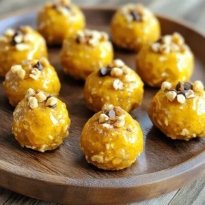 - 1 cup rolled oats - 1/2 cup canned pumpkin puree - 1/4 cup almond butter (or your choice of nut butter) - 1/4 cup honey or maple syrup - 1/2 teaspoon vanilla extract - 1 teaspoon pumpkin pie spice - Pinch of salt - 1/4 cup chopped nuts (walnuts or pecans) - 1/4 cup mini chocolate chips or raisins - Calories per serving: About 100 - Protein content: 2 grams - Fiber content: 3 grams When you gather these ingredients, you set the stage for a tasty treat. Rolled oats serve as the base, giving each bite a hearty texture. Canned pumpkin puree brings moisture and a rich flavor that screams fall. Almond butter adds creaminess and healthy fats, while honey or maple syrup sweetens the mix. The vanilla extract rounds out the flavors, and pumpkin pie spice makes everything feel festive. Optional ingredients like chopped nuts and chocolate chips offer extra crunch and sweetness. You can mix and match to fit your taste. In terms of nutrition, these bites pack a punch. Each serving gives you about 100 calories, 2 grams of protein, and 3 grams of fiber. This makes them a great snack for energy and fullness. For the complete recipe, you can check out the Full Recipe section. - In a large mixing bowl, combine: - 1 cup rolled oats - 1/2 cup canned pumpkin puree - 1/4 cup almond butter (or your choice of nut butter) - 1/4 cup honey or maple syrup - 1/2 teaspoon vanilla extract - 1 teaspoon pumpkin pie spice - Pinch of salt Mix these ingredients well. Use a spatula to ensure everything blends together. You want a sticky dough. This sticky texture helps the bites hold their shape later. If you like, fold in some extras: - 1/4 cup chopped nuts (like walnuts or pecans) - 1/4 cup mini chocolate chips or raisins Make sure to distribute these evenly. This adds crunch and sweetness. The more you mix, the better the flavors combine. Now, it’s time to shape the bites. - Scoop small portions of the mixture. - Roll each portion into 1-inch balls. Place the balls on a plate or parchment paper. Leave space between them. After shaping, refrigerate the bites for at least 30 minutes. This helps them firm up. Enjoy these tasty bites chilled or at room temperature as a quick snack! For the full recipe, check out the details above. To make great energy bites, size matters. Aim for about 1 inch for each bite. This helps them cook evenly. Use a light touch when mixing the dough. Overworking it can make them tough. Gently blend the ingredients until they come together. Want more flavor? Try making your own pumpkin pie spice. Combine cinnamon, nutmeg, and ginger to find your perfect mix. You can also adjust sweetness. Use honey or maple syrup to make them sweeter or less sweet. Taste as you go! When it's time to serve, make it pretty! Arrange your energy bites on a decorative plate. This makes them look special. Add a sprinkle of pumpkin pie spice on top for a nice touch. It looks great and adds extra flavor. For the full recipe, check out [Full Recipe]. {{image_4}} You can make your pumpkin pie energy bites even more fun with flavor twists. Try adding toasted coconut for a tropical vibe. The sweet and crunchy texture makes each bite delightful. You can also switch your nut butter. Use peanut or cashew butter instead of almond butter. Each nut brings its own taste, making the bites unique. If you need a gluten-free snack, use gluten-free oats in your mix. This small change keeps the bites delicious and safe for those with gluten sensitivities. For a vegan option, swap honey with agave nectar. This keeps your bites sweet while fitting a plant-based diet. You can tailor these bites to fit the seasons. For fall, mix in some spiced apple or cider. This adds a warm, cozy flavor that feels like autumn. For summer, a hint of citrus zest can brighten the bites. It gives them a fresh burst that’s perfect for hot days. For the full recipe, check the details above and make your own tasty energy bites! Store your pumpkin pie energy bites in an airtight container in the refrigerator. This keeps them fresh and tasty. If you plan to eat them soon, you can keep them at room temperature for short durations. Just remember, they may not last as long outside the fridge. These energy bites can last up to one week in the fridge. If you want to keep them longer, freeze them. They can stay fresh for up to three months in the freezer. Just make sure to label the container with the date you froze them. You can enjoy these bites chilled or at room temperature. They make a great snack either way! For a delightful treat, pair them with a cup of tea or coffee. The warm drink complements the tasty flavors of the bites perfectly. If you want to try a fun twist, serve them at a party on a festive plate. You can find the full recipe to make these delicious bites. To make pumpkin pie energy bites, follow these steps: 1. In a large bowl, mix rolled oats, canned pumpkin puree, almond butter, and honey. 2. Add vanilla extract, pumpkin pie spice, and a pinch of salt. 3. Stir until the mixture becomes a sticky dough. 4. Fold in chopped nuts and chocolate chips or raisins. 5. Scoop out small portions and roll them into balls, about 1 inch wide. 6. Place the bites on a plate with space between them. 7. Refrigerate for at least 30 minutes to firm up. Enjoy your tasty and healthy snack! For more details, check the Full Recipe. Yes, you can freeze these energy bites. To do this, place the bites on a baking sheet. Freeze them for about an hour until solid. Then, transfer them to a freezer bag or an airtight container. Label the bag with the date. These bites can last up to three months in the freezer. When you’re ready to eat them, just let them thaw in the fridge. Pumpkin pie energy bites have many health benefits. They are rich in fiber from the oats and pumpkin. Fiber helps with digestion and keeps you full. Almond butter provides healthy fats and protein. Honey or maple syrup adds natural sweetness without refined sugar. Pumpkin is packed with vitamins A and C, which support your immune system. Overall, these bites are a nutritious snack option. Yes, these energy bites are safe and nutritious for kids. They contain wholesome ingredients that provide energy without added sugar. Kids love the sweet taste and chewy texture. You can also let your children help make them. This way, they learn about healthy snacks. Just remember to check for any nut allergies before serving. These pumpkin pie energy bites are easy to make and fun to eat. You mix simple main ingredients like oats, pumpkin, and nut butter. Add some nuts or chocolate chips for a tasty twist. Remember to store them well to enjoy later. Whether for a snack, dessert, or lunchbox treat, these bites pack nutrition in every bite. Get creative with flavors and enjoy the flexible recipes. Healthy eating can be delicious and effortless. Make these energy bites today and see for yourself!