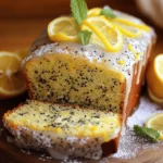 To make a Lemon Poppy Seed Loaf, gather these simple items: - 1 ½ cups all-purpose flour - 1 teaspoon baking powder - ½ teaspoon baking soda - ½ teaspoon salt - ½ cup unsalted butter, softened - 1 cup granulated sugar - 2 large eggs - 2 tablespoons poppy seeds - 2 tablespoons freshly grated lemon zest - ¼ cup freshly squeezed lemon juice - ½ cup buttermilk - 1 teaspoon pure vanilla extract The key ingredients in this loaf create a bright, fresh taste: - Lemon zest: It adds a strong lemon flavor that brightens the loaf. - Lemon juice: This gives a tangy taste and balances the sweetness. - Poppy seeds: These add a nice crunch and a unique flavor. - Buttermilk: It keeps the loaf moist and tender. Choosing quality brands can improve your baking. Here are my favorites: - All-purpose flour: King Arthur or Bob's Red Mill for consistent results. - Unsalted butter: Land O'Lakes offers a rich flavor. - Granulated sugar: Domino has a fine texture that works well in baking. - Buttermilk: Look for brands like Organic Valley for fresh flavor. These ingredients are easy to find at your local store or online. Use fresh lemons for the best zest and juice. 1. First, preheat your oven to 350°F (175°C). 2. Next, grease a 9x5-inch loaf pan. Line the bottom with parchment paper. 3. In a medium bowl, whisk together the flour, baking powder, baking soda, and salt. Set this mix aside. 4. In a large bowl, cream the softened butter and sugar with an electric mixer. Mix until light and fluffy. This takes about 3 to 4 minutes. 5. Add the eggs one by one, mixing well after each addition. 6. Now, stir in the lemon zest and lemon juice. Blend until smooth. 7. Gradually add the dry mixture to the wet mix. Alternate with the buttermilk. Start with the flour and end with it. Mix gently until just combined. 8. Finally, fold in the poppy seeds, making sure they spread evenly. 1. Pour the batter into the prepared loaf pan. Smooth the top with a spatula. 2. Bake in the oven for 55 to 65 minutes. Check for doneness with a toothpick. It should come out clean or with a few moist crumbs. 3. Once done, take the loaf out of the oven. Let it cool in the pan for about 10 minutes. 1. Carefully transfer the loaf to a wire rack to cool completely. 2. For serving, slice the loaf and place it on a decorative platter. 3. Dust the top with powdered sugar or drizzle a lemon glaze for extra flair. 4. Add lemon slices and fresh mint leaves for a pop of color and aroma. To get the best texture for your lemon poppy seed loaf, follow these tips: - Use room temperature ingredients for even mixing. - Measure flour correctly. Use a spoon to fill your measuring cup, then level it off. - Don’t overmix the batter; mix until just combined. This keeps the loaf light and fluffy. Here are some common mistakes that can ruin your loaf: - Forgetting to preheat the oven can lead to uneven baking. - Not lining the pan properly may cause sticking, making it hard to remove the loaf. - Using old baking powder or baking soda may prevent your loaf from rising well. You can easily boost the flavor of your loaf with these ideas: - Add a pinch of salt to balance the sweetness. - Use fresh lemon juice and zest for a brighter taste. - Consider adding nuts or dried fruit for a fun texture and taste. With these tips, you can create a lemon poppy seed loaf that is not only simple but also bursting with flavor! {{image_4}} You can make a gluten-free version of this loaf. Use a gluten-free flour blend instead of all-purpose flour. Look for a blend that contains xanthan gum. It helps to mimic the texture of regular flour. Follow the same steps from the original recipe. The flavor will still shine through. If you prefer muffins, this recipe works great! Simply pour the batter into a muffin tin instead of a loaf pan. Fill each cup about two-thirds full. Bake for 18-20 minutes, watching closely. You can still use the same ingredients and steps as the loaf. These muffins make a perfect grab-and-go snack. You can jazz up your lemon poppy seed loaf with fun add-ins. Try adding fresh blueberries or raspberries for a fruity twist. Chopped nuts, like walnuts or pecans, add a nice crunch. You can also mix in some dried cranberries for extra sweetness. For a richer flavor, add a teaspoon of almond extract or lemon oil. These ideas let you customize your loaf just how you like it! To keep your lemon poppy seed loaf fresh, wrap it tightly in plastic wrap. You can also use aluminum foil. This prevents it from drying out. Store it at room temperature in a cool, dry place. If you live in a warm area, refrigerate it. This helps keep it moist and tasty. If you want to save some for later, freezing works great. First, let the loaf cool completely. Then, wrap it in plastic wrap. Next, place it in a freezer bag. This keeps it safe from freezer burn. It can last up to three months in the freezer. When you’re ready, just thaw it in the fridge overnight. The loaf stays fresh for about 3-4 days at room temperature. If you keep it in the fridge, it can last up to a week. To reheat, simply slice what you need. Warm it in the microwave for about 10-15 seconds. This brings back its soft texture. Enjoy it warm for a delightful treat! You can check if your loaf is done by using a toothpick. Insert it in the center of the loaf. If it comes out clean or with a few moist crumbs, your loaf is ready. This usually takes about 55 to 65 minutes at 350°F (175°C). If you see wet batter on the toothpick, bake a little longer. Always trust your nose too. A lovely lemon smell fills your kitchen when it is close to being done. Yes, you can use lemon extract. However, fresh lemon juice gives a brighter flavor. If using extract, use about 1 tablespoon. You might want to cut back on the sugar a bit, as extract can be more potent. I always prefer fresh lemon juice for the best taste in my recipes. It truly makes the loaf shine! This loaf pairs well with many items. Here are a few ideas: - A cup of tea or coffee - Fresh berries like strawberries or blueberries - A dollop of whipped cream or Greek yogurt - A light lemon glaze for extra sweetness - Slices of lemon or mint for garnish These options elevate the experience and add a fun twist to your meal! Enjoy experimenting with flavors that make you smile. 1. Preheat your oven to 350°F (175°C). Grease a 9x5-inch loaf pan. Line the bottom with parchment paper for easy removal after baking. 2. Mix dry ingredients. In a medium bowl, whisk together 1 ½ cups all-purpose flour, 1 teaspoon baking powder, ½ teaspoon baking soda, and ½ teaspoon salt. Set this aside. 3. Cream butter and sugar. In a large bowl, beat ½ cup unsalted butter and 1 cup granulated sugar with an electric mixer. Mix until light and fluffy, about 3-4 minutes. 4. Add eggs. Add 2 large eggs, one at a time. Mix well after each addition. 5. Incorporate lemon. Stir in 2 tablespoons of freshly grated lemon zest and ¼ cup of freshly squeezed lemon juice until fully mixed. 6. Combine wet and dry. Gradually add the dry flour mix to the wet mix, alternating with ½ cup of buttermilk. Start and end with the flour. Mix gently until combined. 7. Fold in poppy seeds. Gently fold in 2 tablespoons of poppy seeds until they are evenly mixed. 8. Pour batter. Transfer the batter into the prepared loaf pan. Smooth the top with a spatula. 9. Bake. Place the pan in the oven and bake for 55-65 minutes. Check with a toothpick; it should come out clean or with a few moist crumbs. 10. Cool down. Remove the loaf from the oven. Let it cool in the pan for 10 minutes. Then, move it to a wire rack to cool completely. This recipe makes about 10 slices. Each slice contains approximately: - Calories: 180 - Fat: 7g - Carbohydrates: 27g - Protein: 3g - Sugar: 10g For a lovely presentation, slice the loaf and arrange it on a nice platter. - Add a dusting of powdered sugar. - Drizzle with lemon glaze. Mix powdered sugar and lemon juice for a zesty topping. - Garnish with lemon slices and mint leaves. This adds color and freshness. This blog post covered all you need to know about making a lemon poppy seed loaf. We explored key ingredients for great flavor, detailed step-by-step instructions for baking, and shared tips to avoid common mistakes. You can also try fun variations, like muffins or gluten-free options. Remember to store your loaf properly to keep it fresh. With these insights, you’re ready to bake a tasty treat. Enjoying your lemon poppy seed loaf will be the best reward for your efforts. Happy baking!