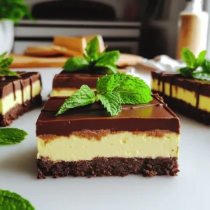 - 1 ½ cups chocolate cookie crumbs - ½ cup unsalted butter, melted - 16 oz cream cheese, softened to room temperature - 1 cup powdered sugar - 1 teaspoon pure vanilla extract - 1 teaspoon peppermint extract - 1 cup heavy whipping cream - 1 cup dark chocolate chips - 1 tablespoon vegetable oil - Fresh mint leaves for garnish To make No-Bake Chocolate Mint Cheesecake Bars, you need simple yet tasty ingredients. The chocolate cookie crumbs form the base, giving a nice crunch. Melted unsalted butter helps bind the crumbs. Cream cheese makes the filling rich and creamy. You will also need powdered sugar for sweetness, along with pure vanilla and peppermint extracts for flavor. For the finishing touch, whip heavy cream until it's light and airy. This adds volume to the cheesecake filling. You will also need dark chocolate chips for a glossy top layer and some vegetable oil to help the chocolate melt smoothly. Finally, fresh mint leaves make a pretty garnish and add a pop of color. Gather these ingredients before you start. Each one plays a key role in making your cheesecake bars delicious. You can find most of these items at your local grocery store. If you want to customize, think about different flavors or types of chocolate. - In a medium bowl, combine 1 ½ cups of chocolate cookie crumbs and ½ cup of melted unsalted butter. Mix until it looks like wet sand. - Firmly press the mixture into the bottom of a 9x9-inch baking dish. Make sure it is even. Chill the crust in the fridge while you make the filling. - In a large bowl, beat 16 oz of softened cream cheese using an electric mixer until smooth. - Gradually add 1 cup of powdered sugar and mix well until there are no lumps. - Add 1 teaspoon of pure vanilla extract and 1 teaspoon of peppermint extract to the cream cheese mixture. Mix until blended. - In another bowl, whip 1 cup of heavy cream until stiff peaks form. Carefully fold this into the cream cheese mix until no white streaks are left. - Spread the cheesecake filling evenly over the chilled cookie crust using a spatula. - In a microwave-safe bowl, melt 1 cup of dark chocolate chips and 1 tablespoon of vegetable oil in 30-second intervals. Stir until smooth. - Drizzle the melted chocolate over the cheesecake layer. Use a spatula to spread it evenly. - Cover the dish with plastic wrap and refrigerate for at least 4 hours, or overnight. This helps the bars set. - Once set, cut the cheesecake into neat bars and garnish with fresh mint leaves before serving. To make the best cheesecake, use room temperature ingredients. This helps the cream cheese mix well. Cold cream cheese can leave lumps. Let it sit out for about 30 minutes before you start. Whipping cream is key for a light texture. Use a clean bowl and beaters when whipping cream. Whip the cream until stiff peaks form. Then, gently fold it into the cream cheese mixture. Start at the bottom and lift it up. This keeps the mixture airy. Avoid stirring too hard, or it will deflate. You can garnish these bars to make them pop. Fresh mint leaves add a bright touch. You can also sprinkle chocolate shavings on top. This makes the bars look fancy and delicious. Pair your cheesecake bars with a scoop of vanilla ice cream. The cold ice cream balances the rich taste of the bars. You can also serve them with a cup of hot coffee. The warm drink enhances the mint flavor. Enjoy your treats! {{image_4}} You can tweak the flavor of these bars to suit your taste. For a different twist, try adding other extracts. You might enjoy using vanilla or almond instead of peppermint. This change can make each bite unique and exciting. You can also swap out chocolate types. If you prefer a sweeter taste, use milk chocolate instead of dark chocolate. Dark chocolate gives a rich flavor, while milk chocolate adds sweetness. Each option creates a new dessert experience. If you need to make it gluten-free, switch the chocolate cookie crumbs for gluten-free cookies. Many brands offer gluten-free options that taste great. This way, everyone can enjoy the bars together. For dairy-free options, use a dairy-free cream cheese. Brands like Tofutti and Kite Hill make good substitutes. You can also replace heavy cream with coconut cream for a rich texture. These simple swaps still keep the bars creamy and delicious. To store your No-Bake Chocolate Mint Cheesecake Bars, keep them in the fridge. Place the bars in an airtight container. They will stay fresh for up to five days. If you want to keep them longer, you can freeze them. Wrap each bar in plastic wrap and then put them in a freezer bag. This method helps to prevent freezer burn. When you are ready to enjoy the frozen bars, thaw them in the fridge overnight. This slow thaw keeps the texture nice. After thawing, take them out and serve. You can add fresh mint leaves for a pop of color. Enjoy your delicious treat! No-Bake Chocolate Mint Cheesecake Bars last about one week in the fridge. Store them in an airtight container to keep them fresh. After a week, the taste and texture may change, so enjoy them sooner for the best flavor. Yes, you can make these bars ahead of time. They taste even better after chilling overnight. This allows the flavors to blend well. Just cover them tightly and keep them in the fridge until you are ready to serve. If you want to skip cream cheese, try using Greek yogurt or silken tofu. Both options give a creamy texture. Greek yogurt adds some tanginess, while silken tofu makes it dairy-free. Blend them well to ensure smoothness. To make these bars without peppermint, simply skip the peppermint extract. You can replace it with vanilla extract or almond extract for a different taste. This change gives the bars a new flavor while keeping them just as delicious. These no-bake chocolate mint cheesecake bars are simple to make and delicious. We covered the ingredients and steps to create a tasty treat. You can customize the flavors to suit your taste, swap ingredients for dietary needs, and store leftovers easily. Now you can enjoy a sweet, refreshing dessert anytime. Try these bars at your next gathering. They are sure to impress!