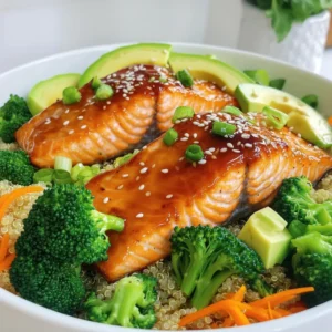 - 2 salmon fillets (6 ounces each) - 2 tablespoons honey - 2 tablespoons soy sauce (or tamari for gluten-free) - 2 cloves garlic, minced - 1 teaspoon fresh ginger, grated - 2 cups cooked quinoa - 1 cup broccoli florets, steamed - 1/2 cup carrots, shredded - 1 ripe avocado, sliced - Sesame seeds and chopped green onions for garnish - Salt and freshly cracked pepper to taste When I make Honey Garlic Salmon Bowls, I always choose fresh ingredients. The salmon fillets are the star here. Each fillet should weigh around 6 ounces. This size cooks well and stays juicy. Honey adds a sweet touch to the dish. I use two tablespoons, which balances the salt from the soy sauce. If you're gluten-free, tamari works just as well. Garlic and ginger bring bold flavors. I use two cloves of garlic and one teaspoon of ginger. Mince the garlic and grate the ginger for the best taste. Quinoa serves as a great base. I like to use two cups of cooked quinoa for its nutty flavor. It pairs well with the salmon. For color and nutrition, I add broccoli and carrots. One cup of steamed broccoli florets and half a cup of shredded carrots make the bowl pop. Finally, I slice one ripe avocado for creaminess. I also garnish with sesame seeds and green onions. They add crunch and a fresh kick. Don't forget to season with salt and freshly cracked pepper. These simple ingredients make a tasty and healthy meal. - In a small bowl, combine honey, soy sauce, garlic, and ginger. - Whisk them together until mixed well. - This sweet and savory mix adds flavor to the salmon. - Preheat a non-stick skillet over medium-high heat. - Season both sides of the salmon with salt and pepper. - Once the skillet is hot, add the salmon skin-side down. - Pour half of the marinade over the salmon. - Sauté for 4-5 minutes until golden brown. - Carefully flip the salmon using a spatula. - Pour the rest of the marinade over the salmon. - Cook for another 3-4 minutes until flaky and cooked through. - In each bowl, layer cooked quinoa first. - Next, add steamed broccoli florets and shredded carrots. - Then, place avocado slices on top of the veggies. - Gently place a salmon fillet on each bowl. - Drizzle the delicious pan sauce over the salmon. - Finish with a sprinkle of sesame seeds and green onions. To make sure your salmon is just right, cook it for about 8 to 10 minutes total. The fish should turn golden on the outside and flake easily with a fork. This means it's done! - Start by seasoning your salmon with salt and fresh pepper. This simple step boosts the taste. - You can use fresh or frozen salmon. Just be sure to thaw frozen salmon before cooking. When you arrange your bowl, aim for a rainbow of colors. This makes the dish more tempting. - Layer cooked quinoa at the bottom. Then, add steamed broccoli, shredded carrots, and avocado slices on top. - Place the salmon fillet carefully on the colors. Drizzle some pan sauce over it to make it shine. For the final touch, sprinkle sesame seeds and chopped green onions on top. This adds a nice crunch and flavor. Serve your bowls while warm for the best taste! {{image_4}} You can easily make this dish fit your needs. For a gluten-free version, swap soy sauce for tamari. This keeps the rich flavor without any gluten. If you're dairy-free, this recipe already works for you. The ingredients are all naturally free from dairy. For veggies, you can switch out broccoli and use bell peppers or snap peas. These options add great color and crunch. You can also change the grain. Instead of quinoa, try brown rice or farro. Both provide a hearty base for the salmon bowl. To give your salmon more zing, consider adding spices. A pinch of red pepper flakes can add heat. You might also enjoy a sprinkle of smoked paprika for a deeper flavor. Feel free to experiment with sauces, too. A splash of sriracha or a drizzle of teriyaki sauce can bring new life to the dish. If you want to switch proteins, try chicken or tofu. Both will soak up the honey garlic sauce well. Cooked shrimp is another tasty choice. Just ensure you adjust the cooking times for any protein changes. To keep your Honey Garlic Salmon Bowls fresh, store them in the fridge. Place leftovers in an airtight container. They can last for up to three days. Make sure to let the salmon cool before sealing it. This helps prevent sogginess. When you're ready to eat, reheat the bowl in the microwave. Use a medium power setting. Heat for about 1-2 minutes, stirring halfway through. You can also reheat in a skillet over low heat. This method keeps the salmon from drying out. Meal prep makes weeknight dinners easy. Start by cooking extra quinoa on the weekend. Store it in the fridge for quick access. You can also pre-chop the broccoli and carrots. Keep them in sealed bags or containers. Another great tip is to marinate the salmon in advance. Just place the fillets in the marinade and store them in the fridge. This adds flavor and saves time. When you are ready to eat, just cook the salmon and assemble your bowls. It’s that simple! Making Honey Garlic Salmon Bowls is quick and easy. It takes about 5 minutes to prep. Cooking the salmon takes around 10 minutes. In total, you can enjoy this meal in just 15 minutes. Yes, you can use frozen salmon. First, thaw the salmon in the fridge overnight. If you're short on time, you can run it under cold water for about 30 minutes. Once thawed, cook it as you would fresh salmon. The salmon will still taste great! These salmon bowls pair well with many sides. Here are some ideas: - Steamed asparagus - Sautéed green beans - A fresh garden salad - Rice or cauliflower rice - Lemonade or sparkling water These sides will enhance your meal and give you more flavors to enjoy! This blog post covered how to make delicious Honey Garlic Salmon Bowls. I shared the needed ingredients, step-by-step cooking instructions, and tips for perfect results. You learned about storage and meal prep to make your cooking easier. Feel free to tweak the recipe with different veggies or flavors to match your taste. Enjoy making and eating this healthy meal that is both fun and simple!