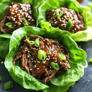 - 1 lb flank steak, thinly sliced - 1/4 cup low-sodium soy sauce - 1/4 cup honey - 2 tablespoons sesame oil - 1 tablespoon rice vinegar - 2 cloves garlic, minced - 1-inch piece of ginger, grated - 1/4 cup green onions, chopped (plus extra for garnish) - 1 head of butter or romaine lettuce, leaves carefully separated - 1 tablespoon sesame seeds - Sriracha sauce (optional, for serving) In this recipe, flank steak is the star. This cut is lean and tender, making it perfect for slow cooking. The low-sodium soy sauce adds depth without too much salt. Honey brings sweetness, balancing the savory flavors nicely. Sesame oil gives the dish its signature nutty taste. Rice vinegar adds a hint of acidity, brightening everything up. Aromatics like garlic and ginger enhance the beef’s flavor profile. Green onions add freshness and a nice crunch. For serving, crisp lettuce leaves act as wraps. You can choose either butter or romaine lettuce. Both options are great for holding the beef. Finally, sesame seeds sprinkle on top add a delightful crunch. If you like some heat, Sriracha sauce is a tasty option. It’s all about finding what flavors you love! Start by gathering your ingredients. In your slow cooker, combine: - 1/4 cup low-sodium soy sauce - 1/4 cup honey - 2 tablespoons sesame oil - 1 tablespoon rice vinegar Stir these together until they blend well. Next, add: - 2 cloves garlic, minced - 1-inch piece of ginger, grated Mix these in too. This sauce will give your beef a sweet and savory flavor. Now, take your flank steak and cut it into thin slices. Add the beef to the sauce in your slow cooker. Make sure each piece is well coated in the sauce. This helps the beef soak up all the flavors. Cover your slow cooker and set it to low heat. Cook the beef for 6 to 8 hours. This long cook time makes the beef tender and easy to shred. When the cooking time is up, use two forks to shred the beef right in the slow cooker. Let it sit in the sauce for 15 more minutes. This step helps the beef absorb even more flavor. Before serving, stir in: - 1/4 cup green onions, chopped - 1 tablespoon sesame seeds This adds a nice crunch and extra taste. To make your lettuce wraps, take a fresh lettuce leaf. Place a spoonful of the honey sesame beef in the center. If you like spice, add a drizzle of Sriracha sauce. Top with more green onions for a lovely look. - To achieve tender beef, use flank steak. It cooks well in the slow cooker. - Cut the beef into thin slices. This helps it absorb the sauce. - Marinate the beef in the sauce for at least 30 minutes. This adds more flavor. - Cook on low heat for 6 to 8 hours. Low heat makes the beef soft and juicy. - Serve the beef in a large bowl. Arrange lettuce leaves around it. - Each guest can make their own wraps. This adds fun to the meal. - Use a bright platter for serving. It makes the dish look more appealing. - Add extra green onions on top for color and taste. - For more flavor, try adding crushed red pepper. It gives a nice kick. - You can mix in hoisin sauce for added depth. It pairs well with honey. - If you like it sweeter, add more honey. Adjust to your taste. - Want it spicier? Add more Sriracha sauce when serving. This adds heat. {{image_4}} You can easily swap the beef for other proteins. Chicken works great in this recipe. Use boneless, skinless chicken breasts for a lighter option. Just slice them thinly like the beef. Pork is another tasty choice. Use pork loin, and it will soak up the flavors well. If you prefer a plant-based dish, try tofu or tempeh. Both options are great for soaking up the honey and soy flavors. Cut them into small cubes and follow the same cooking steps. This way, everyone can enjoy a delicious wrap. You can change the sauce to fit your taste. If you want less sugar, use maple syrup or agave nectar instead of honey. Both options keep the sweetness while making it unique. For spice lovers, adjust the heat level. Add more Sriracha or red pepper flakes for extra kick. You can also mix in some chili paste for a new flavor twist. Just remember to taste as you go! The type of lettuce you use can change the dish's vibe. Butter lettuce is soft and easy to fold. Romaine is a bit crunchier and adds a nice texture. You can even use iceberg lettuce for a crisp bite. Consider serving these wraps with side dishes too. Rice or quinoa pairs well, adding more filling to the meal. You can also add fresh veggies like carrots and cucumbers for extra crunch. Enjoy creating your perfect plate! After you enjoy your Slow Cooker Honey Sesame Beef, store any leftovers right away. Use an airtight container to keep the beef fresh. This method helps maintain the dish's flavor and moisture. You can safely store it in the fridge for up to three days. If you want to keep it longer, freezing is a good option. To freeze the beef mixture, let it cool completely first. Then, place it in a freezer-safe bag or container. Make sure to remove as much air as possible to avoid freezer burn. You can freeze it for up to three months. When you're ready to eat, thaw it in the fridge overnight. Reheat it in a pan over medium heat until warm. You can also use the microwave for quick reheating. Leftovers can be fun and versatile! Try using the beef in tacos or over rice for a new meal. You can also top a salad with the honey sesame beef for a tasty lunch. If you meal prep, pack the beef and lettuce leaves separately. This way, you can enjoy fresh lettuce wraps throughout the week. The best cut for this dish is flank steak. It has good flavor and tenderness. This cut cooks well in the slow cooker. The long cooking time makes it easy to shred. You can also try sirloin or chuck if you prefer. Both offer great taste, but flank steak is my top choice. To add spice, use more Sriracha sauce. You can also stir in red pepper flakes. Both options increase the heat without changing the dish's flavor. If you want more heat from the start, add fresh chili peppers to the sauce. This gives a nice kick to the honey and soy blend. Yes, you can cook on high heat. However, I recommend cooking on low for best results. Cooking on high takes about 3 to 4 hours. You still want the beef tender. Check it often to ensure it doesn't overcook. Cooking low and slow gives the best taste. Great sides include rice or quinoa. They balance the dish well. You can also serve steamed veggies for a healthy addition. Another option is a light salad with sesame dressing, which complements the wraps. These sides make your meal more filling and satisfying. To ensure tender beef, slice it thinly before cooking. Flank steak is tender when cooked low and slow. The slow cooker works wonders here. After cooking, shred the beef well. Let it sit in the sauce to soak up flavor and moisture. This step is key for a juicy bite. This blog post walks you through making delicious Honey Sesame Beef Lettuce Wraps. We covered the key ingredients, tips for perfecting the beef, and how to store leftovers. Remember to be creative with variations and accompaniments. You can easily adapt the recipe to your taste or try different proteins. Enjoy these wraps as a fun meal or snack anytime. Make it your own and savor every bite!