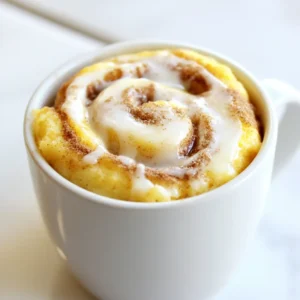 - 4 tablespoons all-purpose flour - 2 tablespoons granulated sugar - 1/4 teaspoon baking powder - 1/4 teaspoon ground cinnamon - 1/8 teaspoon salt - 3 tablespoons milk or almond milk - 1 tablespoon melted butter or coconut oil - 1/4 teaspoon vanilla extract - 1 tablespoon brown sugar for the cinnamon swirl - 1 teaspoon ground cinnamon for the cinnamon swirl Gather all these simple ingredients. You will find that each one plays a key role in creating a tasty mug cake. The flour gives structure, while sugar adds sweetness. Baking powder helps it rise. Ground cinnamon fills it with warm spice. Salt brings out the flavors. Milk adds moisture, and melted butter makes it rich. Vanilla extract adds a nice aroma. Brown sugar and cinnamon create the delightful swirl. This mix of flavors makes each bite special. You can swap milk for almond milk. Use coconut oil for a vegan cake. Each option works well. This recipe allows for some fun tweaks while keeping the taste great! {{ingredient_image_2}} First, grab a microwave-safe mug. In the mug, whisk together the dry ingredients. Mix 4 tablespoons of all-purpose flour, 2 tablespoons of granulated sugar, 1/4 teaspoon of baking powder, 1/4 teaspoon of ground cinnamon, and 1/8 teaspoon of salt. Make sure there are no lumps. Next, pour in the wet ingredients. Add 3 tablespoons of milk, 1 tablespoon of melted butter, and 1/4 teaspoon of vanilla extract. Mix well until the batter is smooth and lump-free. Now, let's create the cinnamon swirl. In a small bowl, combine 1 tablespoon of brown sugar and 1 teaspoon of ground cinnamon. Stir until mixed evenly. Take the cinnamon swirl mixture and drop spoonfuls on top of your cake batter. Use a toothpick or fork to gently swirl the mixture into the batter. Aim for a marbled look without fully mixing it in. Place your mug in the microwave. Cook it on high for about 1 minute and 30 seconds. At the 1-minute mark, start checking for doneness. The edges should look set, but the center can stay slightly moist. Be careful not to overcook it. Once it's done, let the mug cake cool for about 1 minute. Now, you are ready to enjoy a delicious treat! To make the best cinnamon roll mug cake, avoid overcooking. Check your cake often. Start watching it at one minute. Each microwave is different. If yours has high wattage, it may cook faster. If it’s lower, it might take longer. Adjust your time based on your microwave’s power. I love to drizzle icing on top. To make this, mix powdered sugar with a bit of milk. This simple icing makes the cake shine. For a special treat, add a scoop of vanilla ice cream. The warm cake and cold ice cream create a yummy contrast. You can make this mug cake your own. Try adding nuts or chocolate chips for extra flavor. If you want a vegan mug cake, use coconut oil and almond milk. For gluten-free versions, swap the all-purpose flour with a gluten-free blend. You can easily tailor this cake to fit any diet or taste. Pro Tips Use Room Temperature Ingredients: For the best texture, ensure your milk and melted butter are at room temperature before mixing them into the dry ingredients. Don’t Overmix: Gently mix the batter until just combined to prevent a dense mug cake. A few lumps are okay! Adjust Cooking Time: Microwave wattages vary. Start checking your mug cake at 1 minute to avoid overcooking, which can lead to dryness. Add Toppings: Enhance your mug cake by adding nuts, chocolate chips, or a dollop of whipped cream for extra flavor and texture. {{image_4}} You can switch up the flavor of your mug cake. Try making a pumpkin spice mug cake. Just add pumpkin puree and pumpkin spice to the batter. It gives a warm, cozy taste perfect for fall. Another fun twist is the chocolate cinnamon roll mug cake. Mix in some cocoa powder with your dry ingredients. The chocolate pairs well with the cinnamon swirl. It’s a treat for chocolate lovers! You can easily make this mug cake fit your diet. For a dairy-free option, use almond milk instead of regular milk. You can also swap melted butter with coconut oil for a vegan treat. If you need a gluten-free version, use a gluten-free flour blend. Many blends work well and keep the cake tasty and tender. Toppings can elevate your mug cake. Cream cheese frosting is a great choice. It adds a sweet, tangy flavor that balances the cinnamon. Just mix cream cheese, powdered sugar, and a bit of milk for a quick frosting. Fresh fruit or berries also make great toppings. Strawberries, blueberries, or bananas add freshness and color. They make your mug cake look and taste even better! If you have any cinnamon roll mug cake left, cool it down first. Then, place it in the fridge. This treat is best eaten fresh, but you can save it for later. To warm up your cake, microwave it for just a few seconds. Watch closely to keep its soft texture. You don’t want it to dry out. You can make the dry mixture ahead of time. Just mix the flour, sugar, baking powder, ground cinnamon, and salt. Store it in an airtight container. This way, you can whip up a quick mug cake anytime! If your mug cake doesn’t cook evenly, check your microwave’s placement. Center the mug for the best heat distribution. If your microwave is older or less powerful, you might need to cook it longer. Start with 1 minute and check every 15 seconds. This way, you avoid overcooking and keep the cake moist. Yes, you can use different milk alternatives. Almond milk works well for a dairy-free option. Soy milk or oat milk also fits nicely in the recipe. Each milk gives a slight change in taste but keeps the cake tasty. Just ensure your choice is unsweetened if you want to control the sugar. This recipe is easily scalable. If you want to make more servings, just multiply the ingredients. Each mug will need the same amount of dry and wet ingredients. Keep the cooking time the same, but check doneness for each mug. This way, you can enjoy a delicious treat with friends or family! This post covered all the steps to make a delicious mug cake. We explored the right mix of ingredients, provided clear cooking instructions, and shared tips to enhance flavor. Remember to check your cake often to avoid overcooking. You can also get creative with toppings and variations. Enjoy every bite fresh and warm. Try different flavors to find your favorite. A mug cake is quick, fun, and satisfies your sweet tooth. Happy baking!