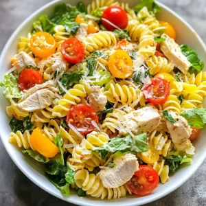 - 2 cups rotini pasta - 2 cups cooked chicken breast, diced - 1 cup fresh romaine lettuce, chopped - ½ cup cherry tomatoes, halved - ½ cup Parmesan cheese, freshly shredded - ¼ cup Caesar dressing - 1 tablespoon olive oil - 1 clove garlic, finely minced - Salt and pepper to taste - Fresh parsley for garnish Gathering the right ingredients is key. Start with rotini pasta. It holds the sauce well. You’ll need cooked chicken breast. This adds protein and flavor. Fresh romaine lettuce adds crunch and color. Cherry tomatoes give a sweet burst. Parmesan cheese adds a rich, nutty taste. For dressing, use your favorite Caesar dressing. You’ll also need olive oil and garlic. They create a flavorful base for the dressing. Don’t forget salt and pepper to taste. Fresh parsley is optional but brightens up the dish. Make sure to have everything ready before you start. This will make the cooking process smoother and more enjoyable. {{ingredient_image_2}} First, you need to boil some salted water. I usually fill a large pot with water and add a good pinch of salt. Once the water is boiling, add 2 cups of rotini pasta. Cook the pasta according to the package instructions, usually around 8 to 10 minutes. You want it to be al dente, which means it should be firm to the bite. After cooking, drain the pasta and rinse it under cold water. This stops the cooking and cools it down quickly. If you have raw chicken, season the chicken breast with salt and pepper. Next, you can grill or bake it until it reaches an internal temperature of 165°F. This ensures it is fully cooked and safe to eat. Once done, let the chicken rest for a few minutes. After resting, dice it into bite-sized pieces. This makes it easy to mix and eat in the salad. Now, grab a large mixing bowl. In this bowl, combine the chilled rotini pasta, diced chicken, 1 cup of chopped romaine lettuce, and ½ cup of halved cherry tomatoes. You can also add ½ cup of freshly shredded Parmesan cheese. Stir gently to mix everything. In a small skillet, heat 1 tablespoon of olive oil over medium heat. Add 1 clove of finely minced garlic and sauté it for about a minute. You want it to be fragrant but not burnt. Remove the skillet from heat and let it cool for a minute. Drizzle the Caesar dressing over the salad. Then, pour in the garlic oil and mix everything together gently. Season with salt and pepper to taste. To let the flavors meld, cover the salad with plastic wrap or a lid. Refrigerate it for at least 30 minutes. This chilling step is key, as it enhances the overall taste. Just before serving, give the salad one final toss to make sure the dressing is evenly distributed. If you like, you can sprinkle freshly chopped parsley on top for a touch of color and flavor. - Use homemade Caesar dressing for freshness. It boosts the taste and adds depth. - Add crushed red pepper for heat. This small touch gives your salad a nice kick. - Serve in a large, shallow bowl. This makes the salad look inviting and colorful. - Garnish with extra Parmesan and tomatoes. It adds a pop of color and flavor. - Use chilled ingredients to maintain crispness. Keep your pasta and veggies cold for the best bite. - Best served shortly after chilling. This way, you enjoy all the fresh flavors at their peak. Pro Tips Cook Pasta Al Dente: Make sure to cook the rotini pasta until it's al dente for the perfect texture in your salad. This prevents it from becoming mushy when mixed with the dressing. Use Fresh Ingredients: For the best flavor, use fresh romaine lettuce and high-quality Caesar dressing. Fresh ingredients enhance the taste and presentation of your salad. Chill Before Serving: Allowing the salad to chill for at least 30 minutes helps the flavors meld together, making each bite more flavorful and refreshing. Customize Your Salad: Feel free to add other ingredients like croutons, olives, or even avocado. This allows you to personalize the salad to your taste preferences. {{image_4}} If you want a meat-free meal, you can swap the chicken for chickpeas or tofu. Chickpeas add protein and a nice texture. Tofu is another great choice. It soaks up flavors well. Use firm tofu for the best results. Just sauté it with a little oil for a tasty bite. Feel free to get creative with extra ingredients. Cucumbers bring a nice crunch. They add freshness and hydration. You can also toss in olives for a briny kick. Avocado is another great addition. It adds creaminess and healthy fats. These add-ons make your salad even more exciting. Look to the seasons for fresh veggies. Asparagus is great in spring. It adds a lovely crunch and bright flavor. Bell peppers are perfect in summer. They come in many colors and add sweetness. These seasonal choices keep your salad vibrant and full of life. To keep your Chicken Caesar Pasta Salad fresh, store it in an airtight container in the fridge. This helps prevent moisture loss and keeps your salad crispy. Make sure the lid is tight, so no air gets in. If you want to freeze your salad, it’s best to freeze only the pasta and chicken. The other ingredients don't freeze well. To thaw, move the salad to the fridge a day before you eat it. This helps maintain texture and flavor. For the best taste, consume your Chicken Caesar Pasta Salad within 3-4 days. This keeps the ingredients fresh and tasty. After that, the salad may lose its crunch and flavor. Always check for any signs of spoilage before eating. Yes, you can make Chicken Caesar Pasta Salad ahead of time. It actually tastes better after sitting for a while. The flavors blend well when you chill it. I suggest preparing the salad a few hours before serving. Just follow these best practices for meal prep and storage: - Cool the pasta: Rinse the cooked pasta in cold water to stop cooking. - Use fresh ingredients: Pick fresh romaine and tomatoes for the best taste. - Store properly: Keep the salad in an airtight container in the fridge. - Add dressing later: If you plan to store it for a while, add the dressing just before serving. This keeps the salad from getting soggy. Absolutely! This recipe works great for meal prep. It’s easy to divide into portions and store. Here are some tips on keeping ingredients fresh and ready to serve: - Prep ingredients separately: Store chicken, pasta, and vegetables in different containers. - Use airtight containers: This helps keep everything fresh longer. - Layer wisely: Place greens at the bottom and heavier ingredients on top. This keeps the lettuce crisp. - Keep dressing separate: Store the dressing in a small container. Mix it in just before you eat. Yes, you can use different types of pasta! Rotini is fun, but other options work too. Here are some recommendations for pasta alternatives that work well: - Penne: This pasta has a nice bite and holds dressing well. - Fusilli: Similar to rotini, it twists beautifully and holds flavors. - Shells: They can trap bits of chicken and dressing inside for extra flavor. - Gluten-free pasta: If you need a gluten-free option, many brands offer tasty gluten-free pasta. Feel free to experiment and find your favorite type! This blog post shared a tasty Chicken Caesar Pasta Salad recipe. We covered key ingredients, cooking steps, and tips for enhancing flavor. You can also explore fun variations to suit your taste. Remember to store leftovers properly to keep them fresh. With these ideas, you can enjoy a quick meal or impress your guests. Dive into this simple yet delicious dish today!