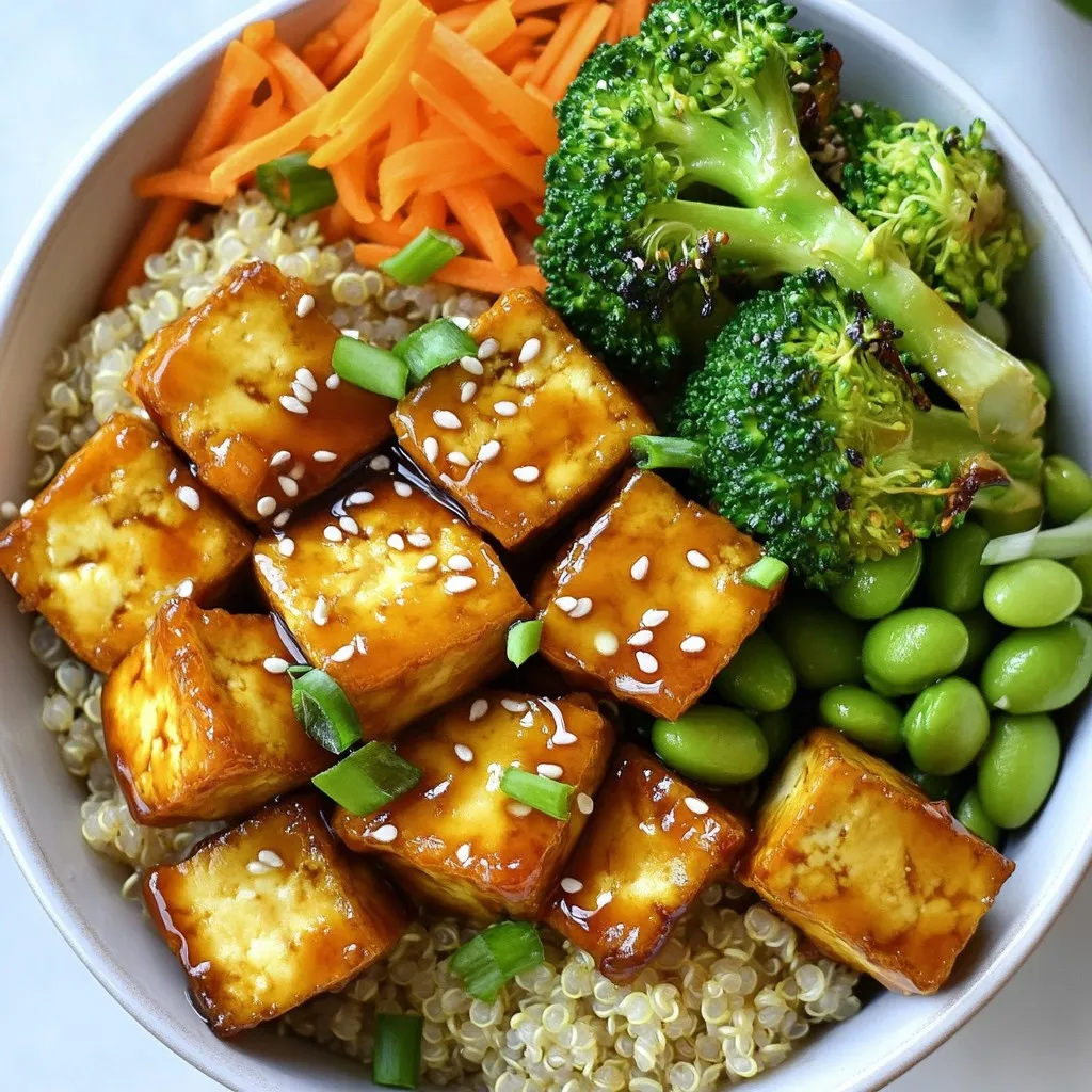To make Teriyaki Tofu Power Bowls, you need fresh and simple ingredients. Here’s what you will need: - 1 block (14 oz) firm tofu, thoroughly drained and pressed - 1/4 cup soy sauce (or tamari for a gluten-free option) - 2 tablespoons pure maple syrup - 1 tablespoon rice vinegar - 1 tablespoon toasted sesame oil - 1 tablespoon cornstarch - 2 cups cooked quinoa or brown rice - 1 cup steamed broccoli florets - 1 cup shredded carrots - 1 cup shelled edamame - 2 green onions, finely sliced - Sesame seeds for garnish - Sriracha sauce for serving (optional) Each ingredient plays a key role. The tofu gives protein and texture. The soy sauce adds saltiness. Maple syrup brings sweetness, while rice vinegar adds a tangy note. Sesame oil gives a rich flavor, and cornstarch helps the tofu get crispy. You can dress up your bowls with these fun toppings: - Finely sliced green onions - Sesame seeds - Sriracha sauce These garnishes add flavor and color. Green onions are fresh and bright. Sesame seeds give a nutty crunch. Sriracha sauce adds heat, perfect for spice lovers. Think about serving these sides with your power bowls: - Steamed bok choy - Roasted sweet potatoes - Cucumber salad These sides complement the flavors of the main dish. They add variety and nutrition to your meal. Enjoy experimenting with different sides to find your favorites! {{ingredient_image_2}} First, you need to press the tofu. This step helps remove extra moisture. Wrap the tofu block in a clean kitchen towel. Then, place a heavy skillet or pot on top. Let it press for about 10 to 15 minutes. Once done, the tofu will be firmer and ready to cut. While the tofu presses, you can make the teriyaki sauce. In a small bowl, mix together the soy sauce, maple syrup, rice vinegar, and sesame oil. Use a whisk to blend them well. This sauce adds great flavor to the tofu. After pressing, cut the tofu into bite-sized cubes. Place the cubes in a bowl. Sprinkle cornstarch over them and toss gently. This coating helps make the tofu crispy. Heat a little oil in a large non-stick skillet over medium-high heat. Add the coated tofu cubes to the skillet. Cook them for about 3 to 4 minutes on each side. You want them golden brown and crispy. Once they are cooked, pour the teriyaki sauce over the tofu. Stir to coat every piece. Cook for another 2 to 3 minutes until the sauce thickens. Now, it’s time to assemble your power bowls. Start with a base of cooked quinoa or brown rice in each bowl. Layer the steamed broccoli, shredded carrots, and edamame on top. Finally, add the teriyaki tofu pieces. Don’t forget to garnish with sliced green onions and sesame seeds. If you want some heat, serve with Sriracha sauce on the side. Tofu holds a lot of water. Pressing is key for better texture. Wrap your tofu block in a clean kitchen towel. Place a heavy skillet on top. Let it press for 10-15 minutes. This step helps to remove excess moisture. The firmer the tofu, the better it absorbs flavors. For crispy tofu, coat it in cornstarch. After pressing, cut the tofu into cubes. Toss the cubes in a bowl with cornstarch. Make sure every piece is coated. Heat a non-stick skillet over medium-high heat. Add a small amount of oil. Cook the tofu cubes for 3-4 minutes per side. They should turn golden brown and crispy. This step makes the tofu crunchy and delicious. Teriyaki sauce can be made your own. Use soy sauce or tamari for gluten-free. Mix in pure maple syrup for sweetness. Add rice vinegar for a tangy kick. Toasted sesame oil gives a nutty flavor. Adjust the flavors based on your taste. You can add garlic or ginger for more depth. Feel free to experiment with your sauce. Pro Tips Press Tofu Well: Ensure you press the tofu long enough to remove as much moisture as possible. This helps achieve a crispy texture when cooked. Customize the Sauce: Feel free to adjust the sweetness of the teriyaki sauce by adding more or less maple syrup according to your taste preference. Experiment with Veggies: You can add or substitute other vegetables like bell peppers, snap peas, or spinach to add variety and nutrition to your power bowls. Use Fresh Ingredients: For the best flavor, use fresh vegetables and high-quality soy sauce or tamari. Fresh ingredients can significantly enhance the overall taste of the dish. {{image_4}} If you want to change up the protein in your Teriyaki Tofu Power Bowls, you have great options. You can use tempeh, chicken, or shrimp instead of tofu. Tempeh adds a nutty taste and a firm texture. Chicken gives a classic flavor, while shrimp cooks quickly and adds a nice seafood twist. Simply prepare them the same way as the tofu. Make sure to adjust cooking times. You can easily swap vegetables to match your taste. If you don’t like broccoli, try bell peppers, snap peas, or zucchini. Each one brings a unique flavor and texture. For extra color, you can add purple cabbage or cherry tomatoes. Don’t forget to steam or sauté them lightly to keep them crisp and bright. To keep your dish gluten-free, use tamari instead of regular soy sauce. This small change keeps the flavor intact. Check other ingredients for gluten too. For example, some rice vinegars may have added ingredients. Always read labels to ensure everything is safe for your diet. With these adjustments, everyone can enjoy a tasty Teriyaki Tofu Power Bowl! To store your Teriyaki Tofu Power Bowls, let them cool down first. Place them in an airtight container. Store in the fridge for up to three days. Keep the tofu and veggies separate from the grains if possible. This helps maintain their texture. When you're ready to eat, take out the leftovers. You can reheat them in a microwave. Heat in short bursts, about 1-2 minutes, stirring in between. If you prefer the stovetop, use a pan over medium heat. Add a splash of water to keep the tofu moist. Cook until heated through. If you want to freeze your Teriyaki Tofu Power Bowls, do so before adding the sauce. Freeze the tofu and veggies in one container. Store the cooked grains in another. They will keep well for about 2-3 months. When ready to eat, thaw overnight in the fridge. Then, sauté the tofu and veggies with the sauce until hot. Yes, you can use soft or extra-firm tofu. Soft tofu will make a creamier dish, while extra-firm tofu stays firmer. If you choose soft tofu, be gentle when cooking. It may break apart easier. You can still enjoy a delicious flavor with either option. This dish is already vegan! The main ingredients are tofu, veggies, and a teriyaki sauce made from soy sauce and maple syrup. Just ensure you use a vegan type of soy sauce. Tamari is a great choice for a gluten-free option. This makes the recipe suitable for all vegan diets. You can serve these bowls with many sides. Here are some ideas: - Steamed asparagus for a fresh crunch. - Brown rice for added fiber. - A simple salad for extra veggies. - Pickled vegetables for a tangy twist. Feel free to mix and match your sides! In this blog post, we explored how to make Teriyaki Tofu Power Bowls. We covered key ingredients, tasty sides, and step-by-step instructions for perfect tofu. Remember the tips for pressing and cooking tofu to achieve that crispy texture. Feel free to customize your teriyaki sauce and explore various protein and vegetable options. Lastly, store leftovers properly and enjoy them later. Now, you have all the tools to create a healthy and delicious meal. Enjoy making this dish your own!